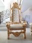 sillón cara de león, hoja de oro, tachuela decorativa orillera, vinipiel crema.